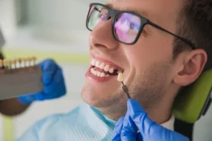 patient being measured for veneers placement